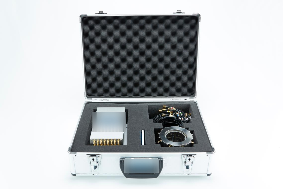 Portable combustion imaging system in its flight case: measurement unit, electrode ring sensor and cabling in cut foam
