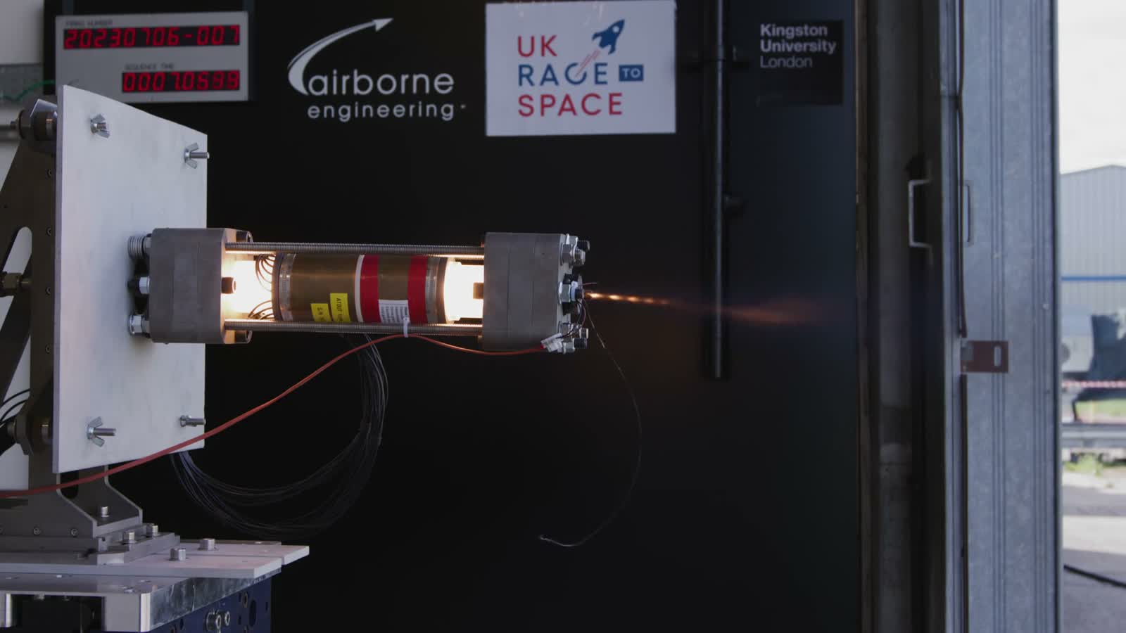 The MACAW hybrid rocket motor firing on the test stand with the ECT sensor head installed