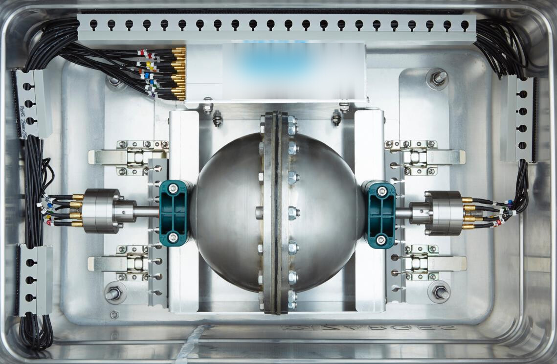 Twin-plane spherical tank sensing system mounted in a slosh test rig, with electrode cabling to both measurement planes